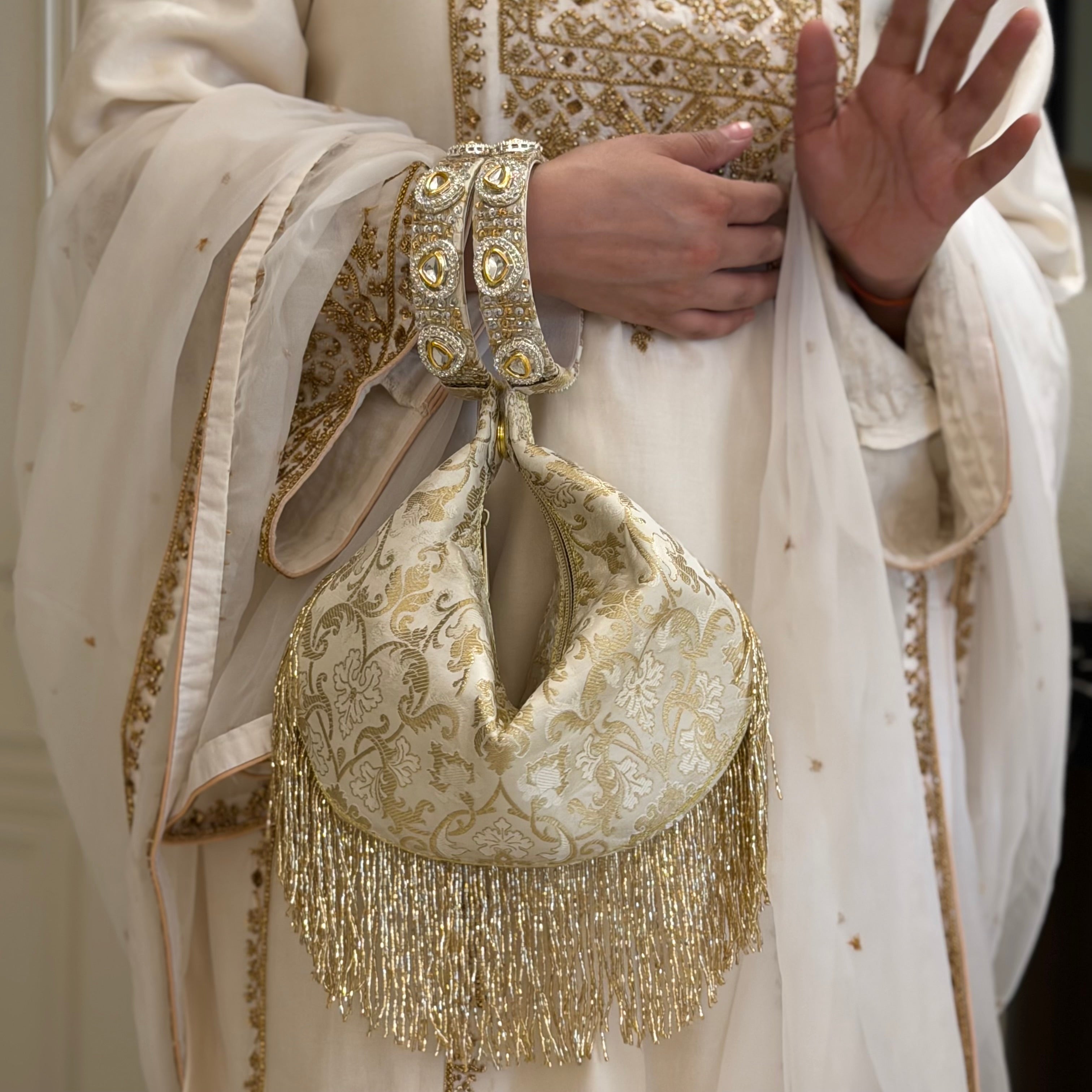 Kundan Brocade Ivory Potli With Tassels