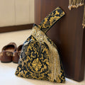 Triangular Brocade Potli Bag In Black With Tassels