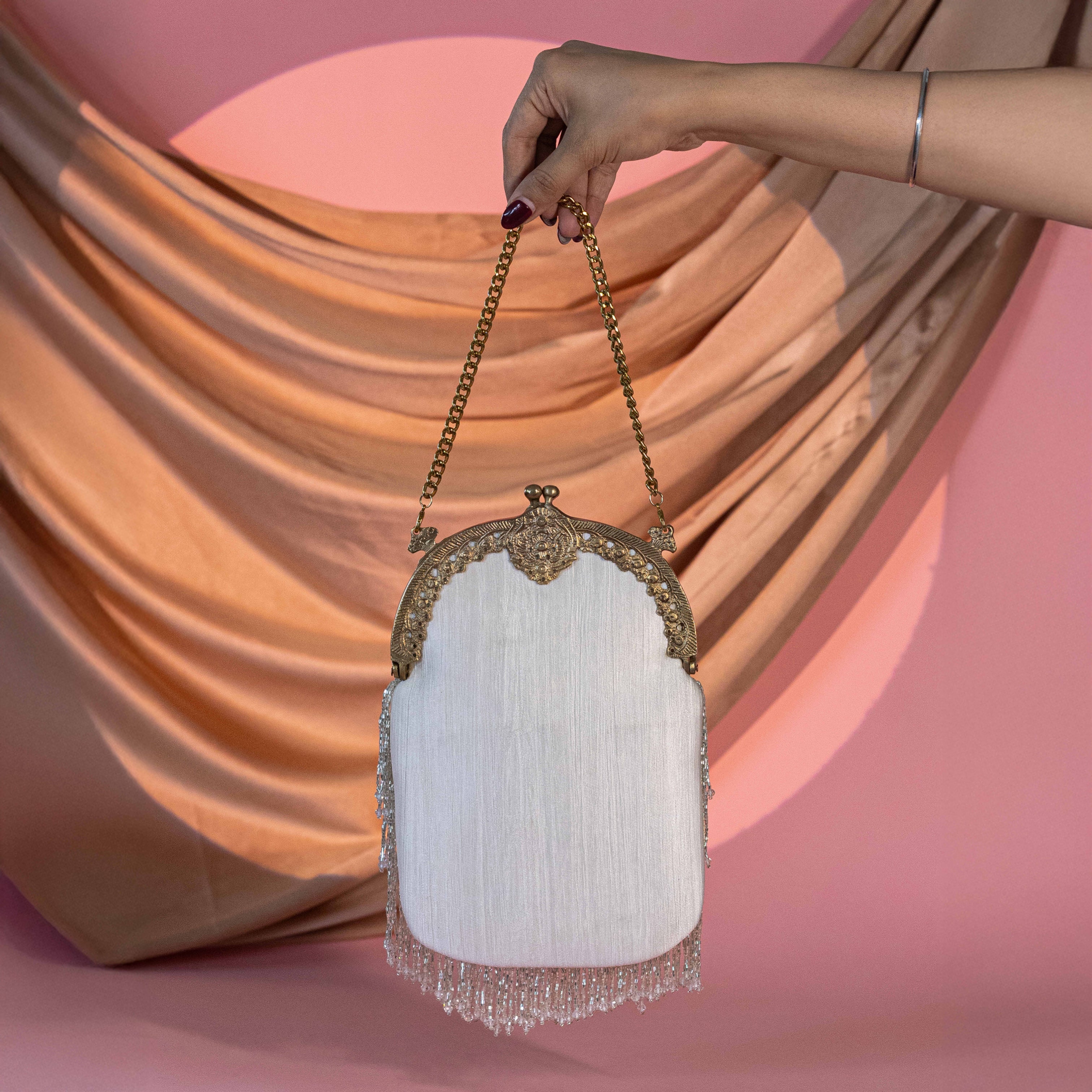Heer Tassel Silver Potli