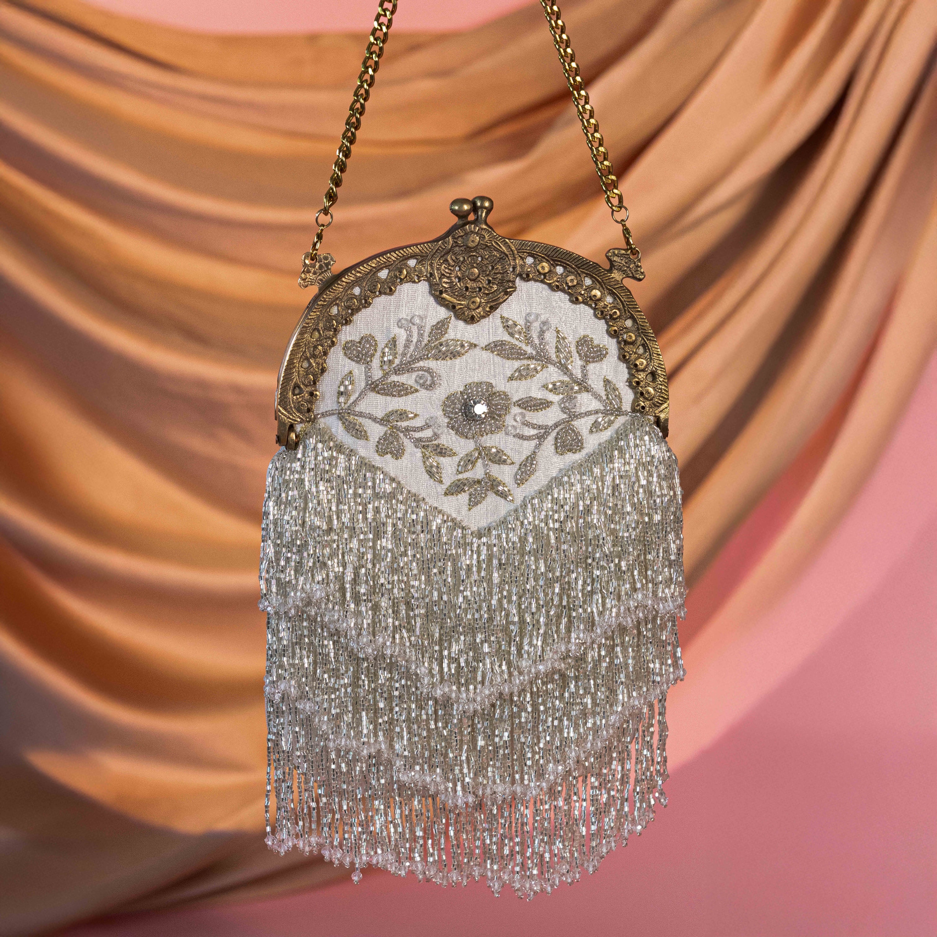 Heer Tassel Silver Potli
