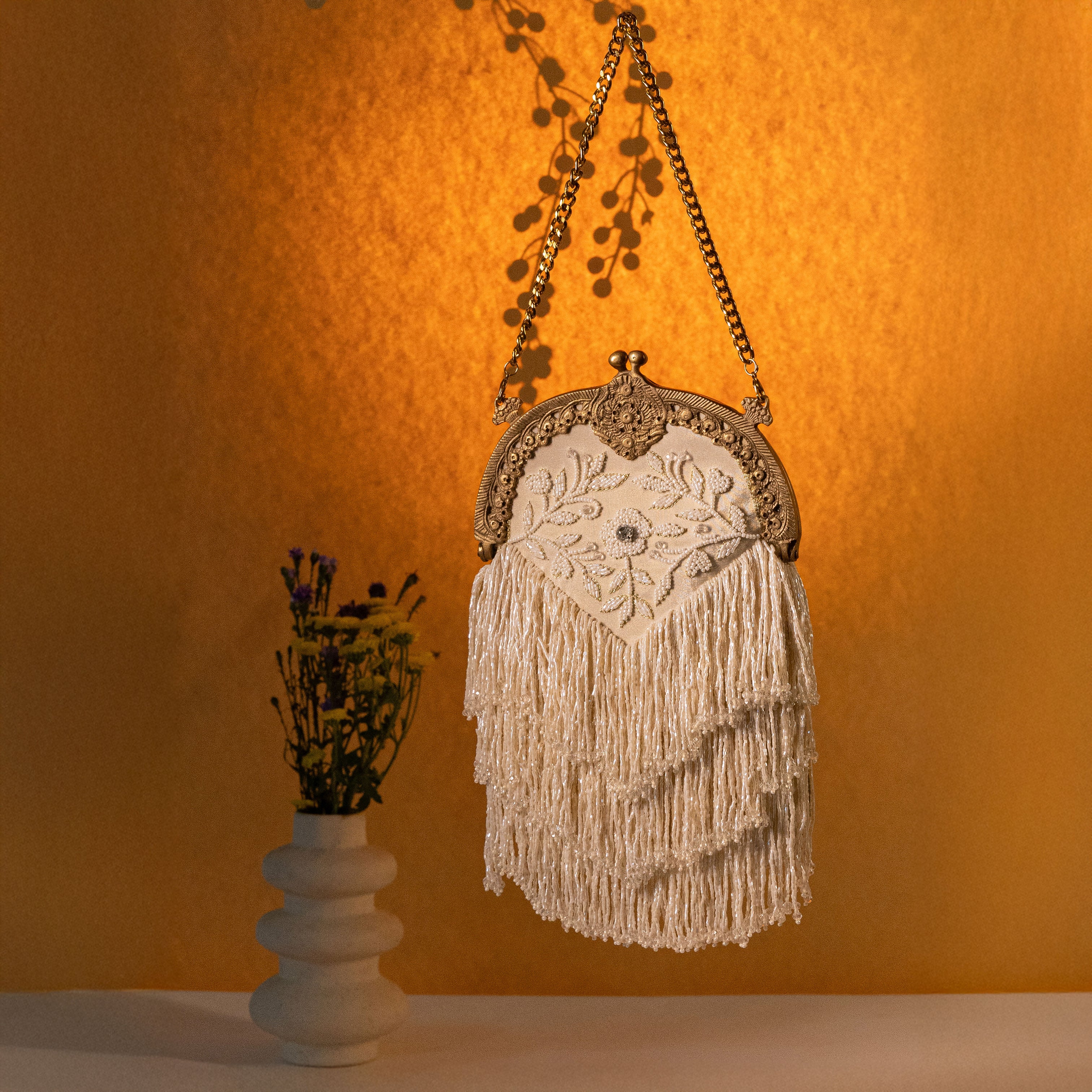 Heer Tassel Ivory Potli