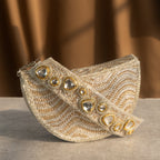 Golden Wave Embellished Clutch With Polki Details Handle