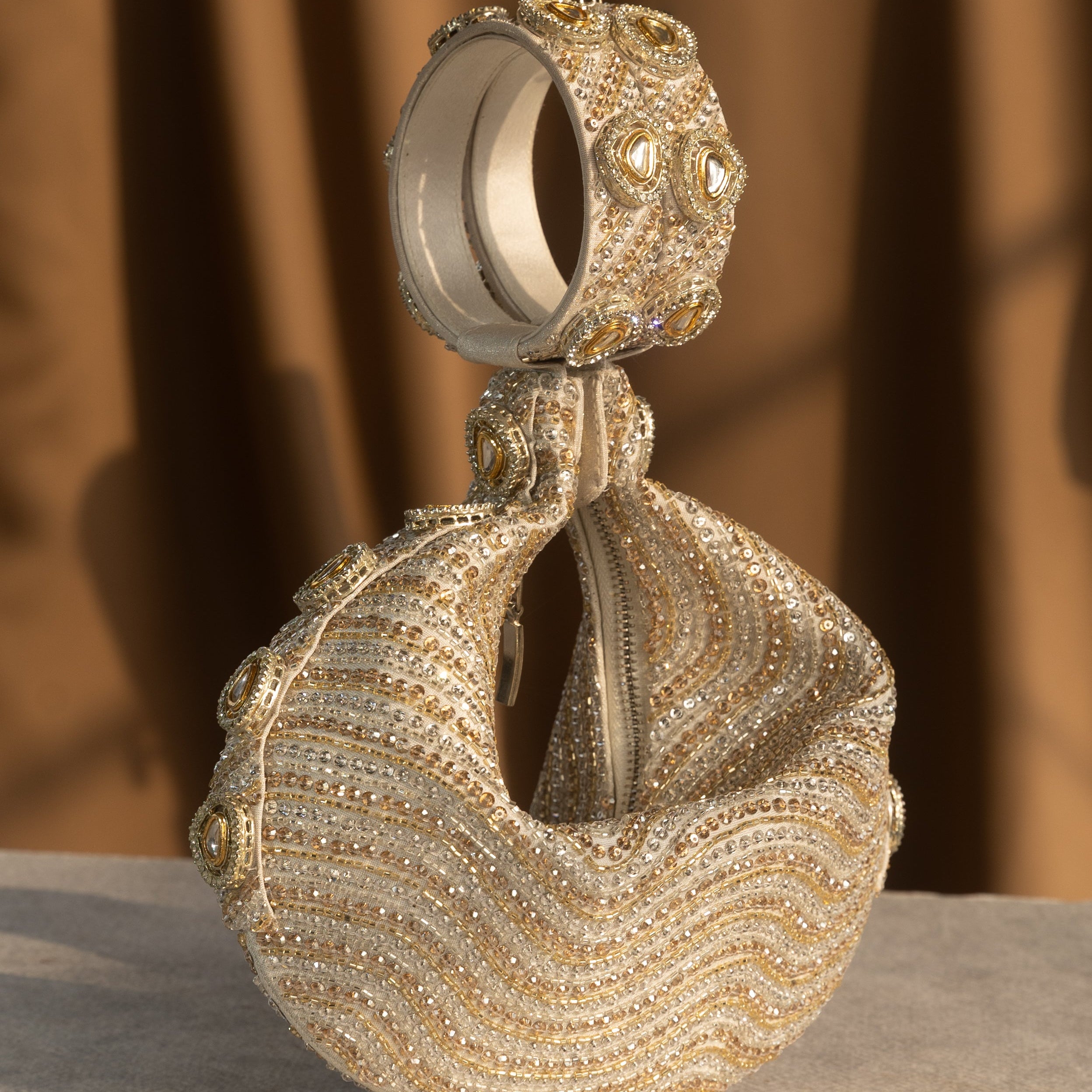 Opulence Embellished Potli Gold