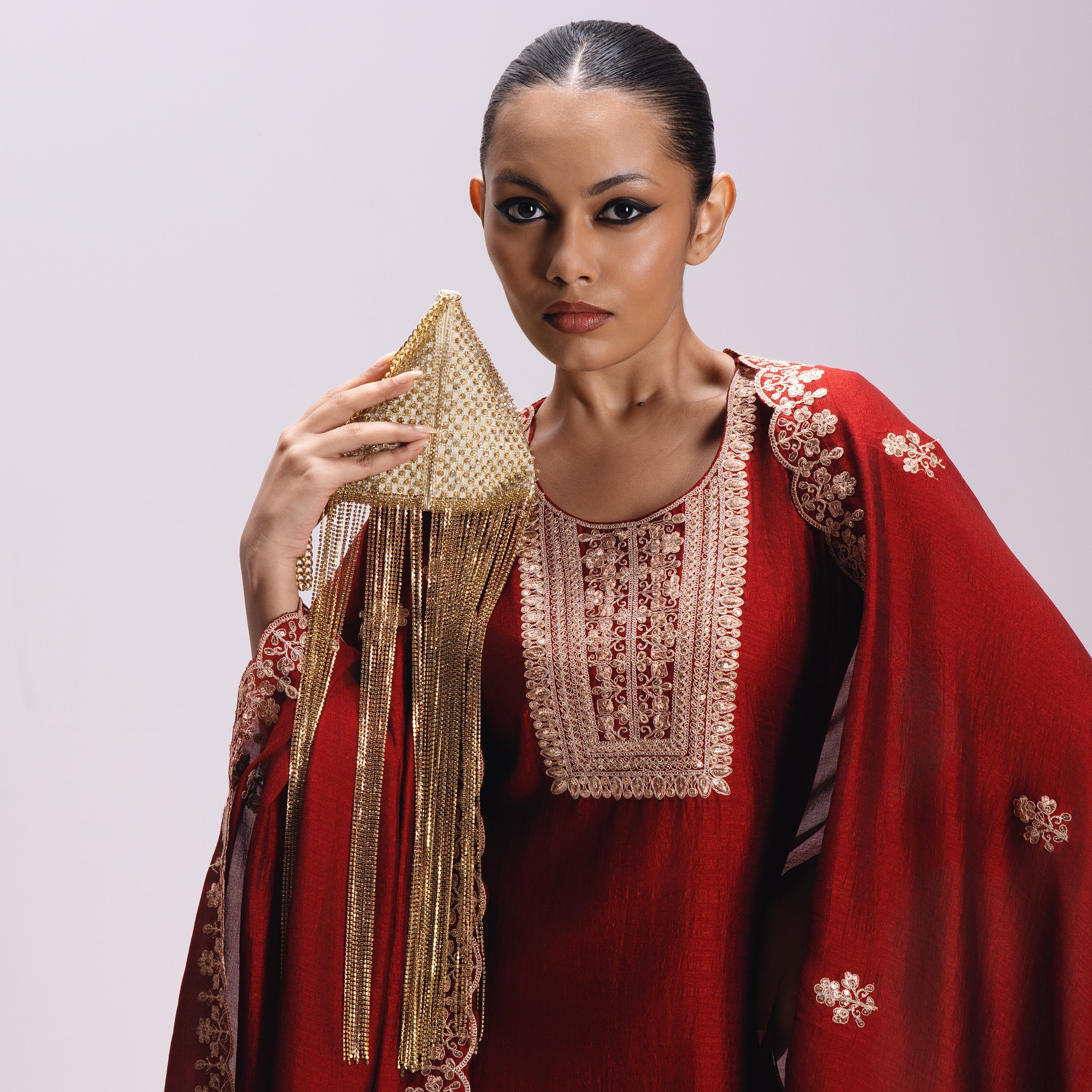 Celest Fringe Gold Clutch
