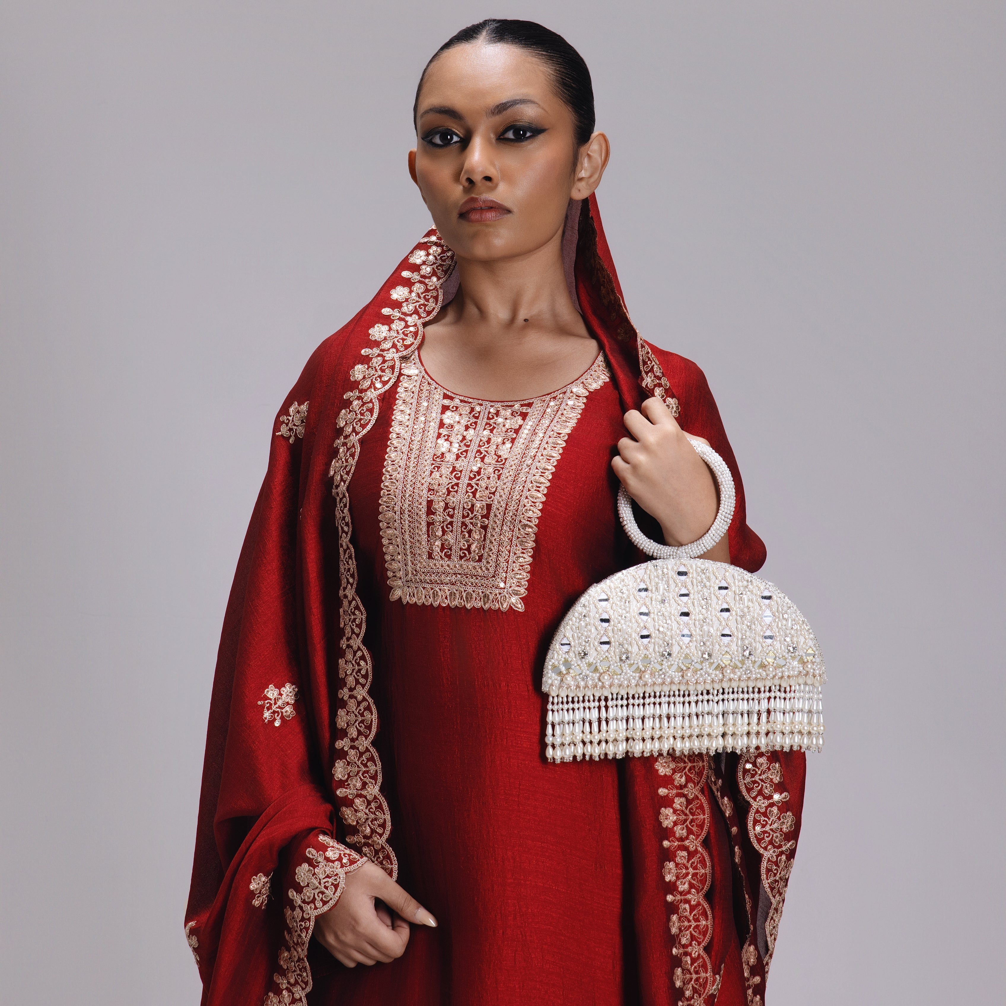 Ziya Mirror Tassel Clutch